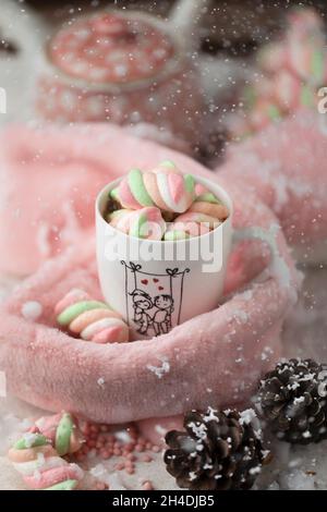 A cup of hot marshmallows in the winter Stock Photo