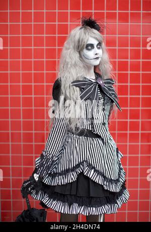 A cosplayer dressed as Jackie Skellington from Tim Burton's movie 'The Nightmare Before Christmas' at the MCM London Comic Con in London ExCeL . Stock Photo