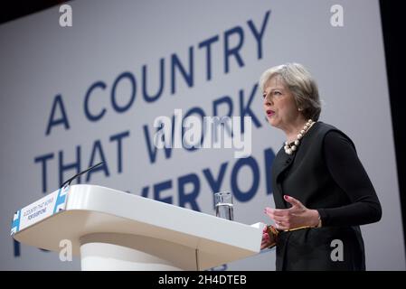 Prime Minister Theresa May gives a speech to delegates in the first day of the Conservative party conference at the International Convention Centre, ICC, Birmingham. Sunday October 2, 2016. Photo credit should read: Isabel Infantes / EMPICS Entertainment. Stock Photo