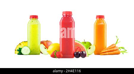 Three Flavors of Freshly Squeezed Fruit and Vegetable Juices in Generic Plastic Bottles with Garnishes Isolated on White Background Stock Photo