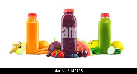 Three Flavors of Freshly Squeezed Fruit and Vegetable Juices in Generic Plastic Bottles with Garnishes Isolated on White Background Stock Photo