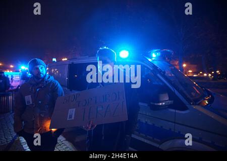 Gdansk, Poland. 01st Nov, 2021. Gdansk, Poland Nov. 1st, 2021 People gathering in front of ruling Law Aand Justice (PiS) party office to protest against abortion ban are seen in Gdansk, Poland, on 1 November 2021 People protest due first victim of the abortion ban was confirmed in Poland. Woman died as doctors waited for the foetus to die instead of aborting it, in which time she suffered from a septic shock. Man holding banner that speaks - stop torture now is seen (Photo by Vadim Pacajev/Sipa USA) Credit: Sipa USA/Alamy Live News Stock Photo