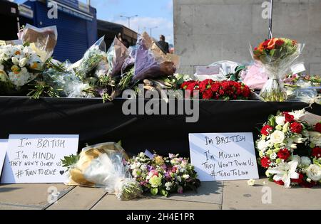 Floral tributes laid in memory of the victims of the London Bridge/Borough Market attack during a minute's silence ceremony to mark the one year anniversary. Picture date: Sunday June 3, 2018 Stock Photo