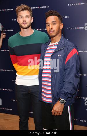 Jim Chapman, left, and Lewis Hamilton attending 'Lewis Hamilton in conversation with Tommy Hilfiger' at their flagship store in Regent's Street, London. Picture dated: Tuesday July 10, 2018. Photo credit should read: Isabel Infantes / EMPICS Entertainment. Stock Photo