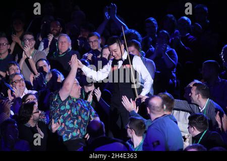 Ding Junhui makes his entrance during day two of the 2019 Dafabet Masters at Alexandra Palace, London. Picture dated: Monday January 14, 2019. Photo credit should read: Isabel Infantes / EMPICS Entertainment. Stock Photo