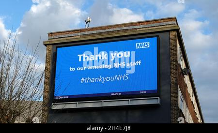 A message of thank you by the NHS on a big screen outside a building in Brixton, south London, as the UK continues in lockdown to help curb the spread of the coronavirus. Picture date: Monday April 6, 2020.  Stock Photo