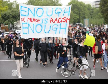 Participants hold a banner during a Black Lives Matter march down Park Lane in central, London, in memory of George Floyd who was killed on May 25 while in police custody in the US city of Minneapolis. Picture date: Wednesday June 3, 2020.  Stock Photo