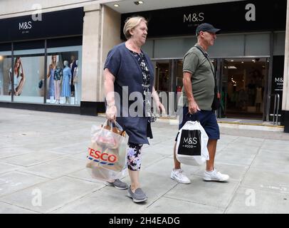 Shoppers outside a Marks and Spencer branch on Oxford Street, London as the retailer has said 950 jobs are at risk as part of plans to reduce store management and head office roles. Picture date: Saturday August 22, 2020. Stock Photo