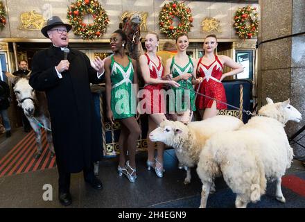 US Cardinal Timothy Cardinal Dolan (L), the Archbishop of New York, stands with members of the Rockettes while blessing the animals appearing in the annual 'Christmas Spectacular Starring the Radio City Rockettes' at Radio City Music Hall in New York, New York, USA, 02 November 2021. The show, which runs from 05 November 2021 until 02 January 2022, features the animals in a live nativity scene, which has been a feature of the Christmas show at Radio City since it began in 1933, though the show was cancelled in 2020 due to the coronavirus pandemic. Stock Photo