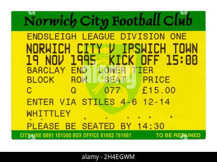 A ticket for a football match (soccer or Association Football) between Norwich City FC and Ipswich Town FC on 19 November 1995. It took place at Carrow Road, the home ground of Norwich. It was in the second tier of the English game (Division One). These matches marked the main football rivalry in East Anglia – a local derby between the major towns of Norfolk and Suffolk. The logo in the centre is an image of a canary, the bird being Norwich City’s emblem, with the team often called ‘The Canaries’.