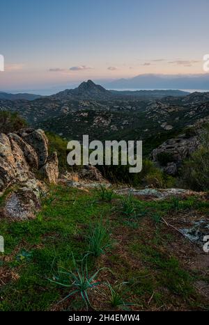 sunrise in the desert des agriate ,corsica France ,showing the rocky landscape .adventure holidays . Stock Photo