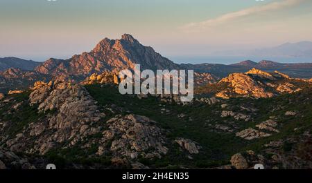 sunrise in the desert des agriate ,corsica France ,showing the rocky landscape .adventure holidays . Stock Photo