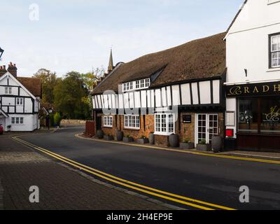 View down Church Street of market town of Princes Risborough Buckinghamshire England UK with Radhuni Indian restaurant in Old Library building Stock Photo