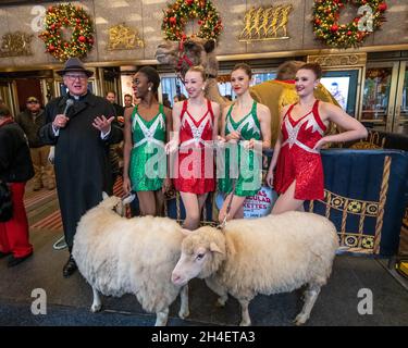 New York, USA. 1st Nov, 2021. New York City's Archbishop Timothy Dolan (L) talks next to Rockettes before blessing the animals that will appear in a living Nativity scene at the Radio Citiy Music Hall Christmas Spectacular in New York City. The show returns after having been cancelled last year during the pandemic lockdown. Credit: Enrique Shore/Alamy Live News Stock Photo