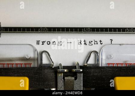 wrong - right ? written on an old typewriter Stock Photo