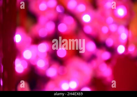 pink and purple glittering blur glowing background Stock Photo