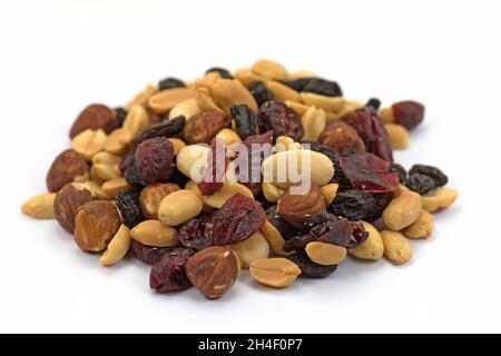 Various nuts and raisins against white background Stock Photo