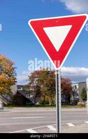 Yield give way sign on street in Ottawa, Canada Stock Photo