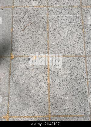 Top view of grey granite paving stone tiles texture Stock Photo
