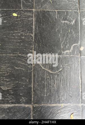 Top view of dark charcoal slate floor tiles texture Stock Photo