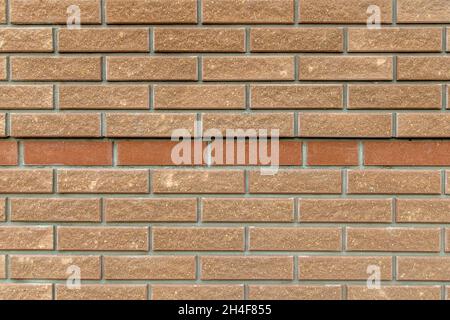Clinker brick brown red decorative wall. Clinker thermal panels for finishing house facade. Tiles for outdoor decoration Stock Photo