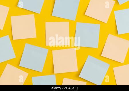 Mock up colored sticky notes on yellow background. Business concept, strategy, planning Stock Photo