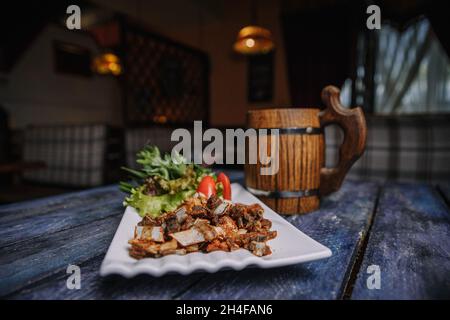 beer appetizer ribs on a wooden background. Stock Photo