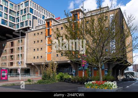 Amsterdam, The Netherlands-May 2021: Low angle view of Pakhuis de Zwijger, a former cold storage warehouse in the style of the post war Modern Movemen Stock Photo