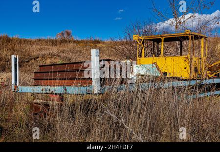 the cab from the tractor standing on the platform in the dump. High quality photo Stock Photo