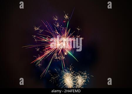 Colorful Fireworks, red blue green and gold, long exposure, horizontal format Stock Photo