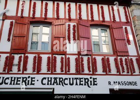 House covered in chillies in the famous village of Espelette, Pays Basque, Pryenees Atlantic, France Stock Photo