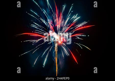 Colorful Fireworks, silver and red, long exposure, horizontal format Stock Photo