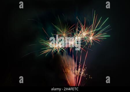 Colorful Fireworks, red and green, long exposure, horizontal format Stock Photo
