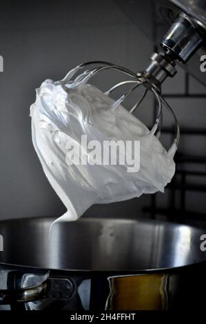 https://l450v.alamy.com/450v/2h4ffht/whisked-egg-whites-in-a-peak-on-a-balloon-whisk-2h4ffht.jpg