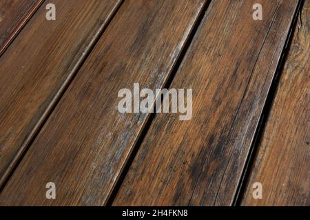Shabby planks background. Peeled varnish on wood. Selective focus Stock Photo