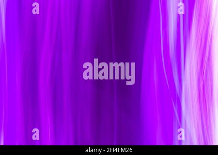 Horizontal abstract lilac-violet background with horizontal lines waves. Backdrop. Blurred curtain. Stock Photo