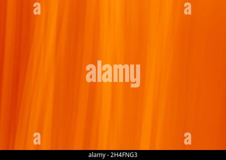 Abstract background in orange shades. A curtain. Soft blurry gradient from lines and waves. Backdrop. Stock Photo