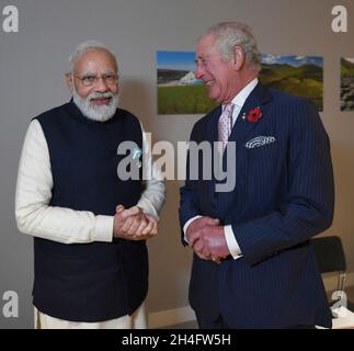 Glasgow, United Kingdom. 01st Nov, 2021. Indian Prime Minister Narendra Modi, left, chats with Charles, Prince of Wales before a bilateral meeting on the sidelines of the COP26 U.N. Climate Summit at the Glasgow Science Centre, November 1, 2021 in Glasgow, Scotland.Credit: PIB Photo/PIB Photo/Alamy Live News Stock Photo
