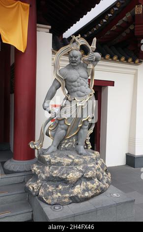 Vajrayana Guardian statue outside the Buddha Tooth Relic Temple on South Bridge Road in Chinatown, Singapore Stock Photo