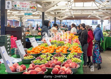 Fruit and vegetable stall in Leicester Market, Market Square, City Centre, City of Leicester, Leicestershire, England, United Kingdom Stock Photo