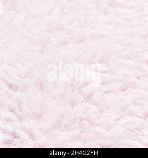 Texture of light pink artificial fur close up. Home decor and comfort concept. Stock Photo