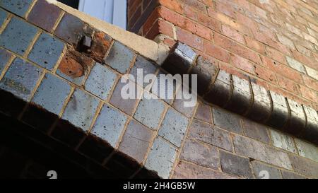 Rustic brick wall detail at heritage listed Winchcombe Carson Limited building at Teneriffe, Brisbane, Australia Stock Photo