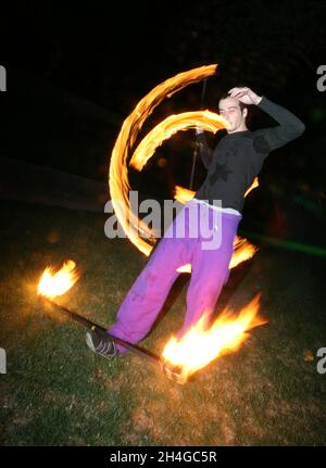 ISTANBUL, TURKEY - AUGUST 26: Poi dancer performing fire dance in the night on August 26, 2010 in Istanbul, Turkey. Stock Photo