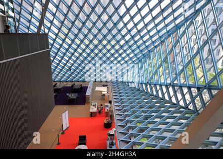 Interior view of Seattle Central Library with sloped glass roof.Downtown Seattle.Washington.USA Stock Photo