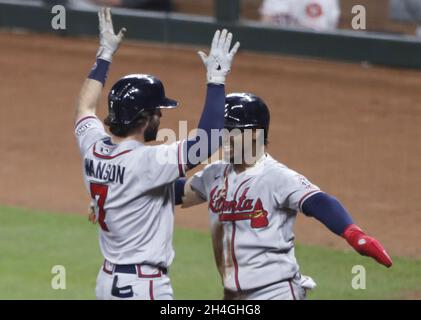 Atlanta, GA, USA. 04th July, 2019. Atlanta Braves shortstop Dansby Swanson  (left) kisses the head of infielder Ozzie Albies (right) after hitting an  eighth inning home run during a MLB game against