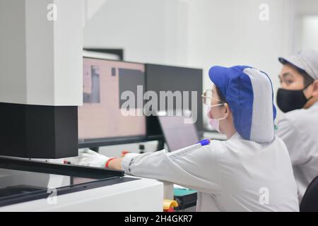 Operator working with computer design product in factory industry Stock Photo