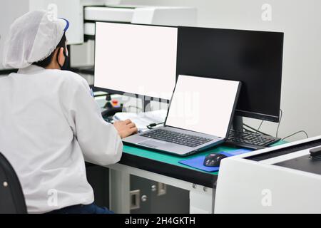 Operator working with computer design product in factory industry Stock Photo