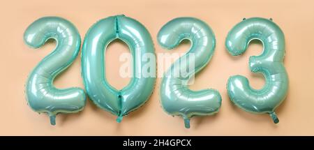 Figure 2023 made of balloons on color background Stock Photo - Alamy