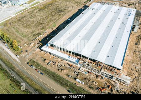 aerial view of large construction site. industrial building, warehouse or logistic center under construction Stock Photo