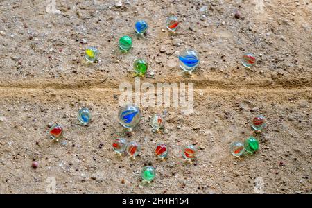 A collection of beads of various colors used in bead play, a traditional Korean game. Stock Photo